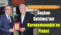 Başkan Satılmış’tan Karaosmanoğlu’na plaket