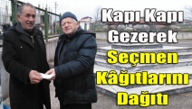 Kapı kapı gezerek seçmen kâğıtlarını dağıtı