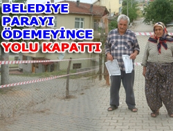 Belediye parayı ödemeyince yolu kapattı Kandıra Akdurak Mahallesi Fatih Caddesi’nde oturan Arif Ersoy, Kandıra Belediyesi
