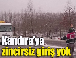 İzmit Çayırköy mevkiinde uygulama yapan jandarma ekipleri kar lastiği ve