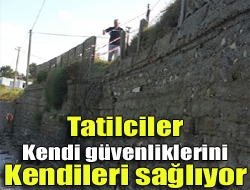 Kandıranın Seyrek sahilinde dalgaların yıktığı duvara yetkililer bir önlem almayınca