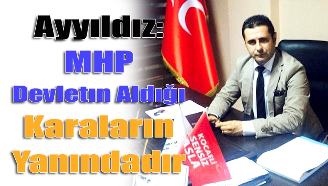 MHP Kandıra ilçe başkanı Özkan Ayyıldız, Kandıra kaymakamı İsmail Çiçek'in