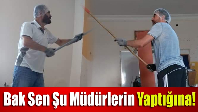 Kandıra'da Zafer İlkokulu müdürü Faruk Özaydın ile Müdür Yardımcısı Hüdaver