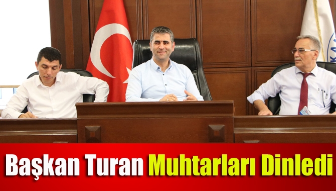 İlçeye bağlı mahallelerin muhtarları ile düzenlenen toplantıda bir araya gelen