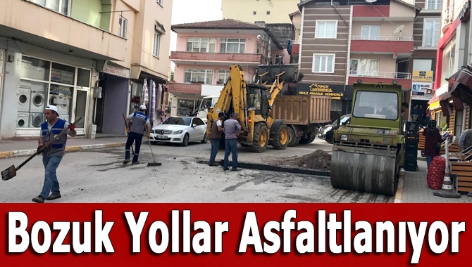 Kandıra Belediyesi Fen İşleri Müdürlüğü ekipleri, merkez mahallelerdeki asfalt yama