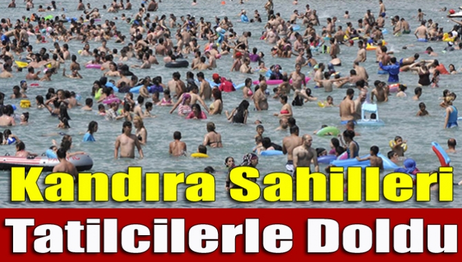 Kandıra'da sahiller tatilcilerle doldu. Karadeniz'in serin sularına giren tatilciler, sahilde