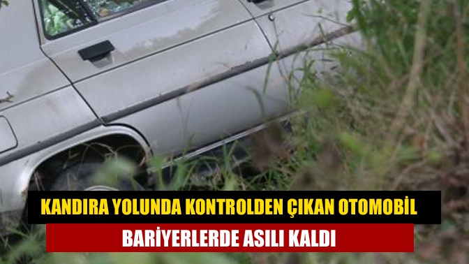 Kandıra’da seyir halindeyken, kontrolden çıkarak bariyerlerin üzerinde asılı kaldı.