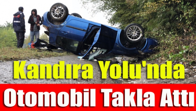 İzmit'te yağmur nedeniyle kayganlaşan yolda kontrolden çıkarak takla atan otomobilde