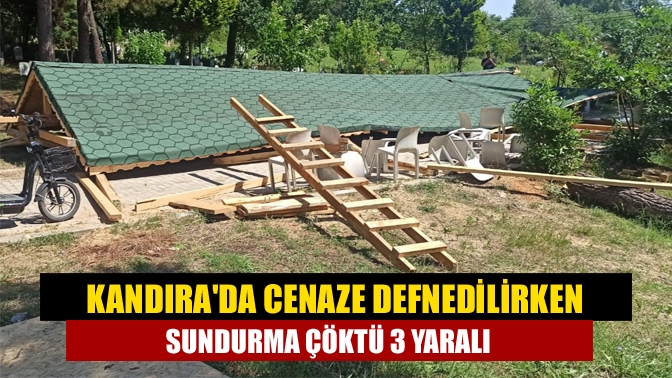 Kandıra Akbal Mahalle Mezarlığında bir cenazenin defin işlemleri sırasında sundurmanın