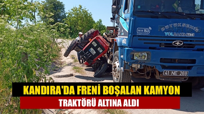 Kandıra Ağacalı köyü mevkiinde freni boşalan kamyon aynı yöndeki traktörü