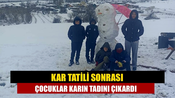 Kandıra Kubuzcu Köyü’nde Kar yağışını büyük bir heyecanla karşılayan minikler,