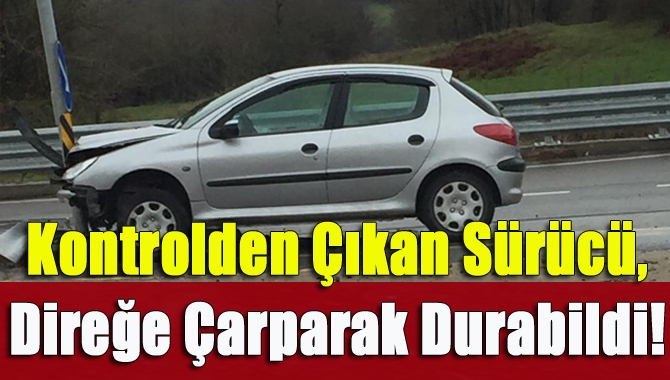 Kandıra Kerpe yolunda direksiyon hâkimiyetini kaybeden sürücü, trafik ışıklarını taşıyan